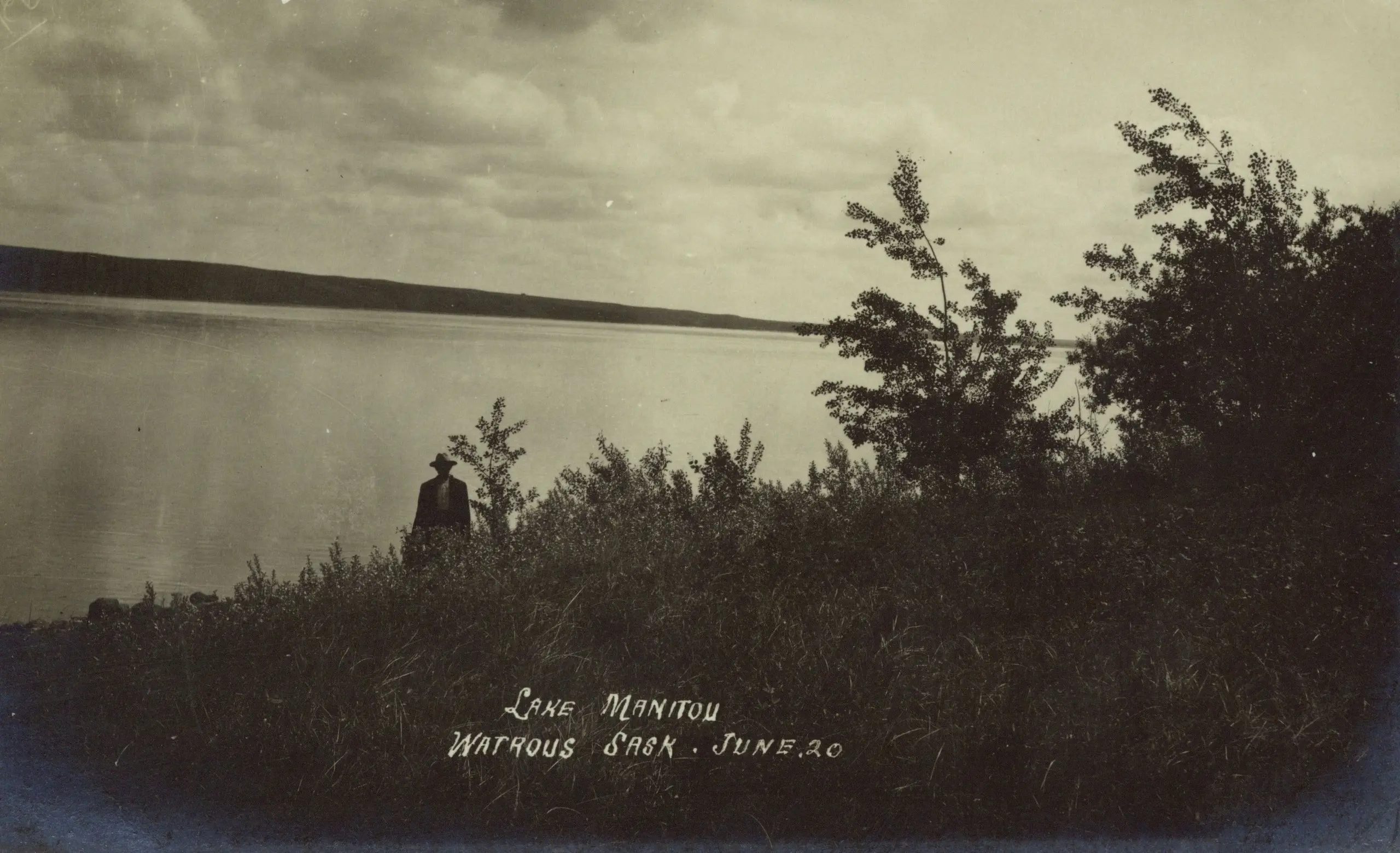 Man at the shore of Lake Manitou